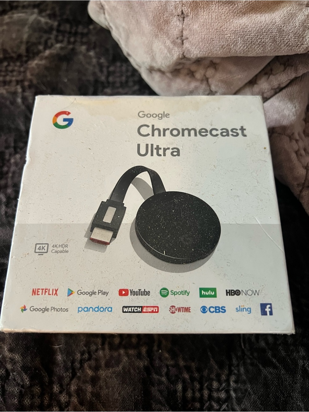 Google Chromecast Ultra in black and silver accents